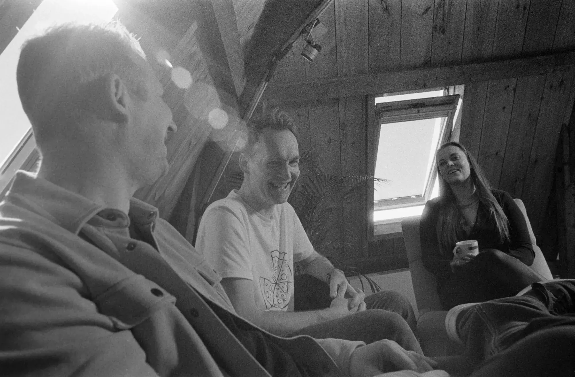 Three colleagues laughing together