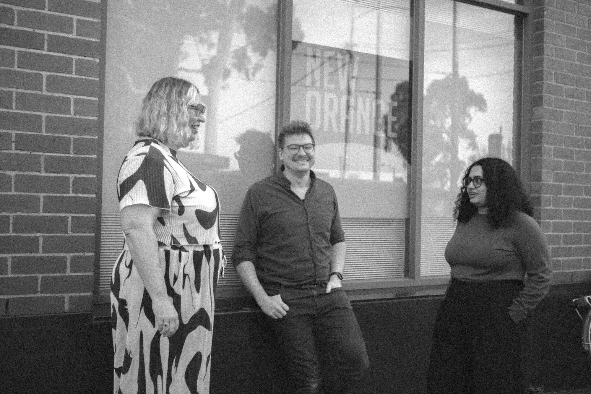 Three colleagues chatting